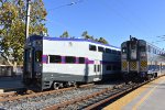 ACE Train # 06 awaits its departure on the left of the Amtrak Capitol Corridor Train